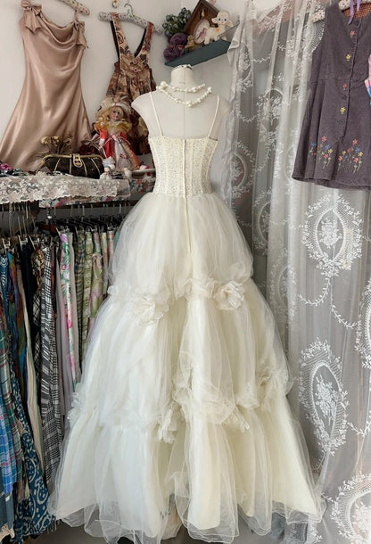 Robe de mariée trapèze classique en tulle blanc cassé à bretelles spaghetti ED02088