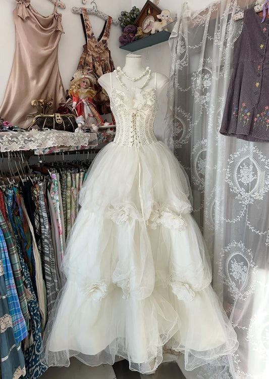 Robe de mariée trapèze classique en tulle blanc cassé à bretelles spaghetti ED02088