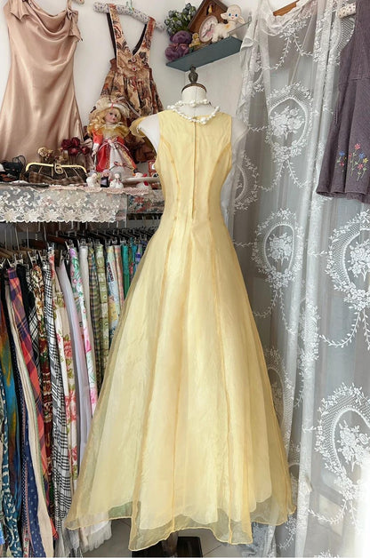 Robe de soirée glamour jaune beurre, col rond, coupe trapèze, en tulle, ED02441